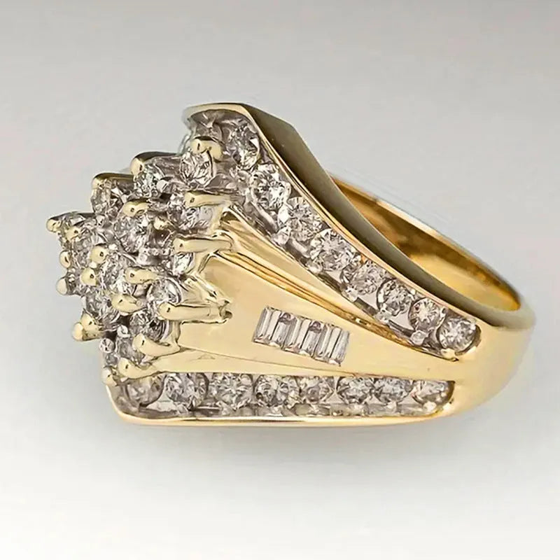 Gold electroplated copper geometric palace style ring shown in sizes 6 to 10