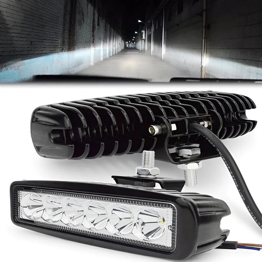 Black die-cast aluminium automotive auxiliary light with six LEDs and a mounting bracket.