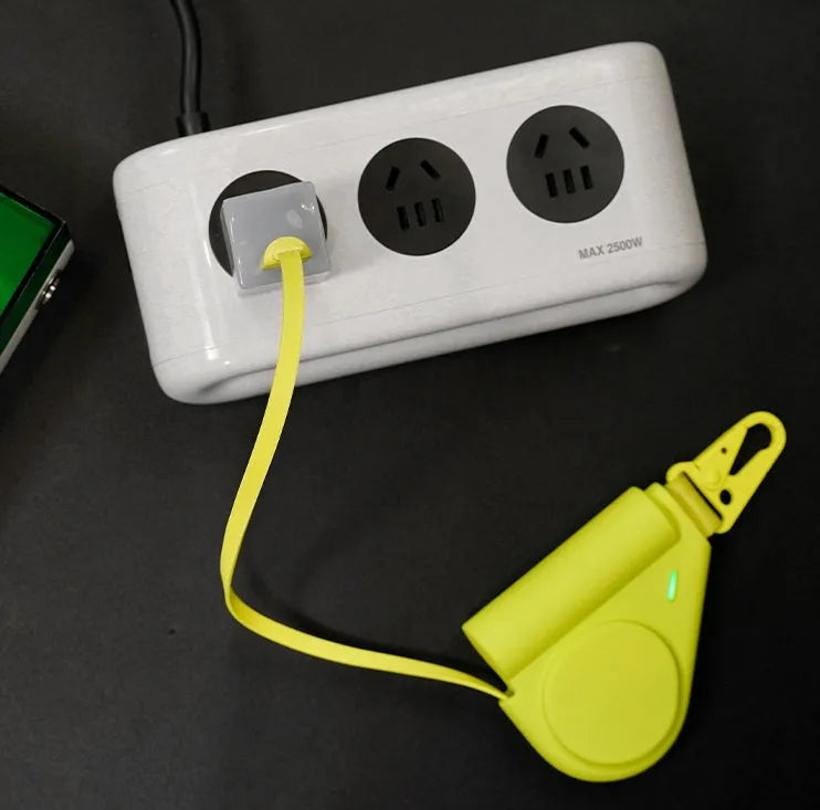 Green power bank with flexible wire and Type-C interface showing 5000 MA capacity