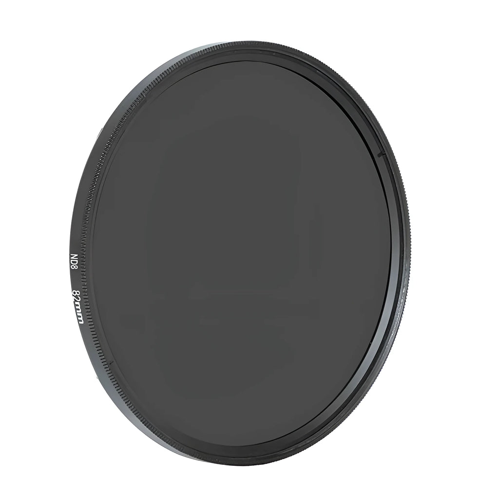 ND8 neutral density camera lens filter with silver aviation aluminium frame, shown next to a lens.