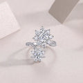 1 carat moissanite wedding ring set in S925 silver with platinum plating on a white background with gift box