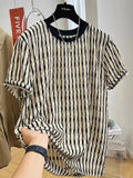 Black and white striped men's casual linen blend shirt with short sleeves and a loose fit.