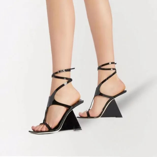 Women's black high heel sandals with a square toe, 9.5cm stiletto heel, and button ankle strap.