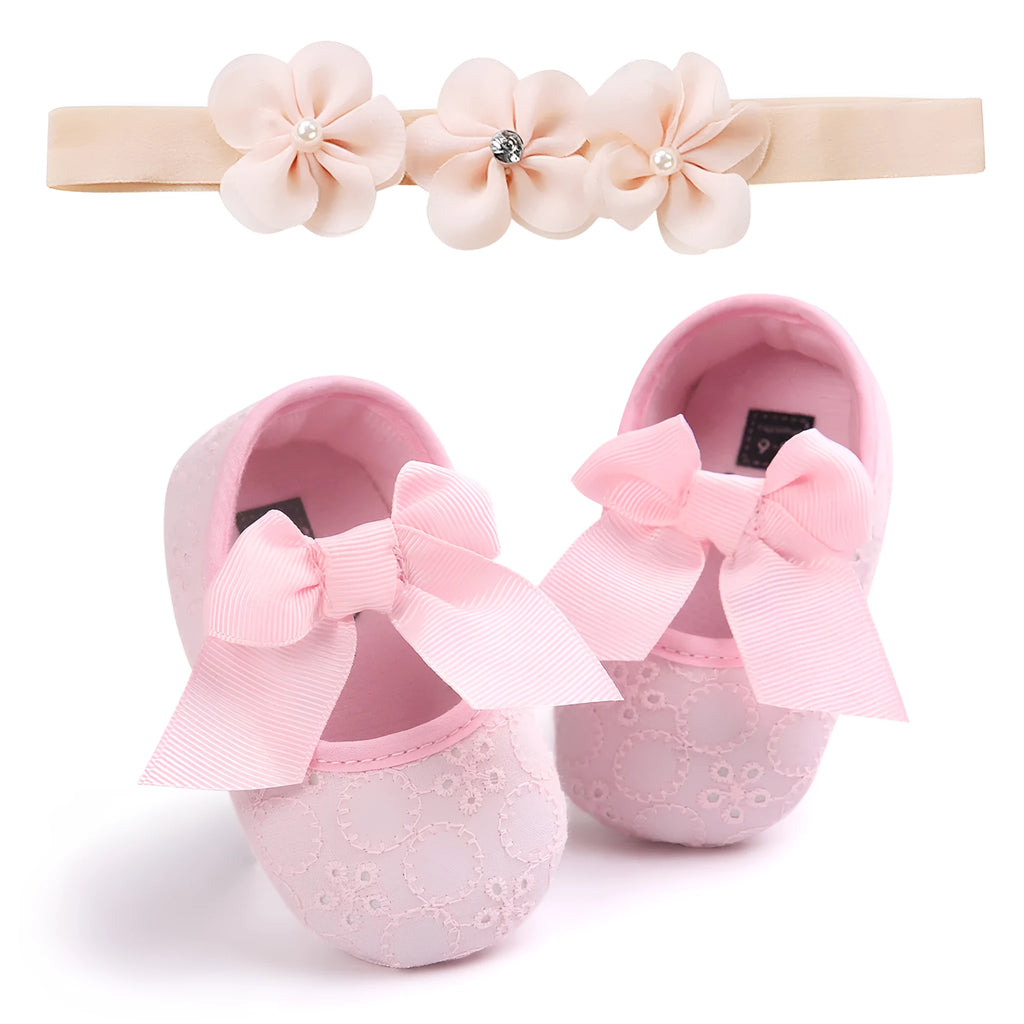 Soft sole pink baby princess shoes for infants shown next to size tags for 11cm, 12cm, and 13cm.
