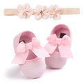 Soft sole pink baby princess shoes for infants shown next to size tags for 11cm, 12cm, and 13cm.