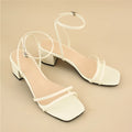 Beige women's square toe stiletto sandals with chunky heel and ankle buckle