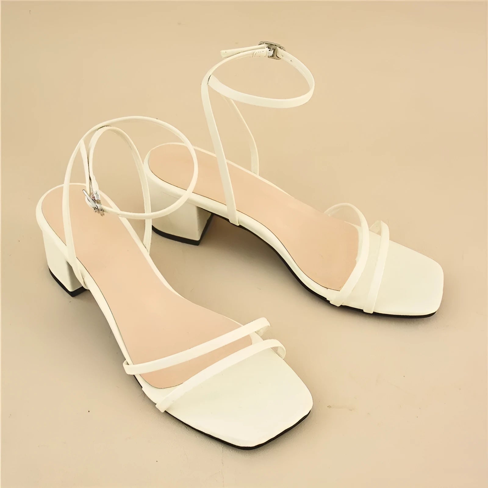 Beige women's square toe stiletto sandals with chunky heel and ankle buckle