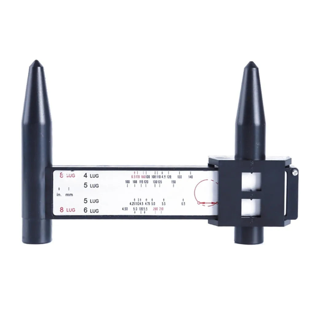 Digital electronic plastic caliper hole distance ruler on a workbench.