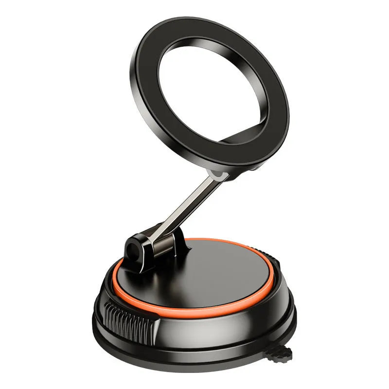 Foldable metal magnetic car phone holder in black and orange on a dashboard
