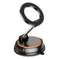 Foldable metal magnetic car phone holder in black and orange on a dashboard