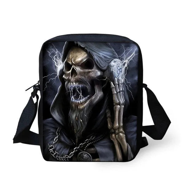 Children's medium messenger bag with skull design, showing adjustable straps and zip opening.
