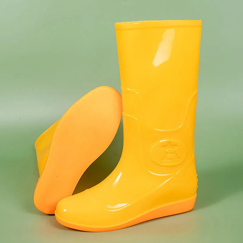 White plastic rain boots with high tube design and flat heel for outdoor labour protection