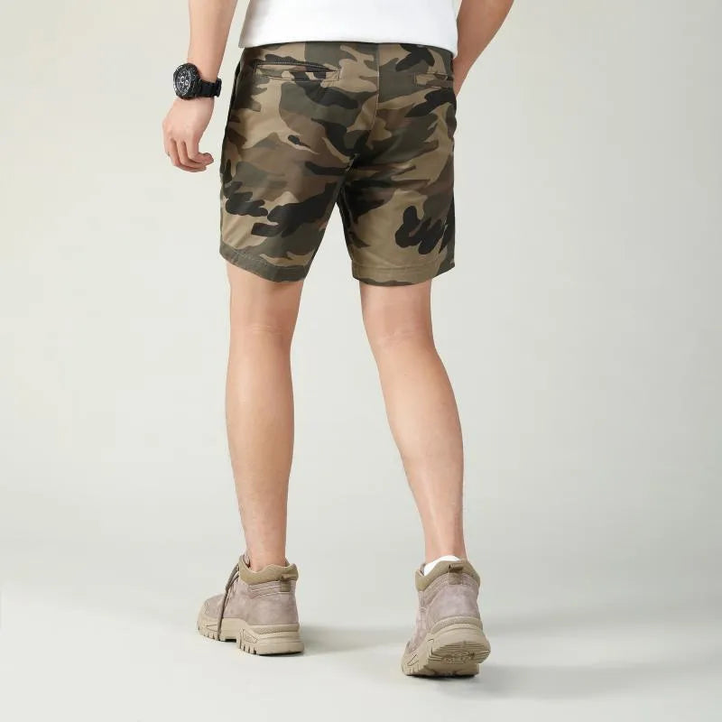 Men's cotton shorts in camouflage green with a zip fly and mid-rise waistband.