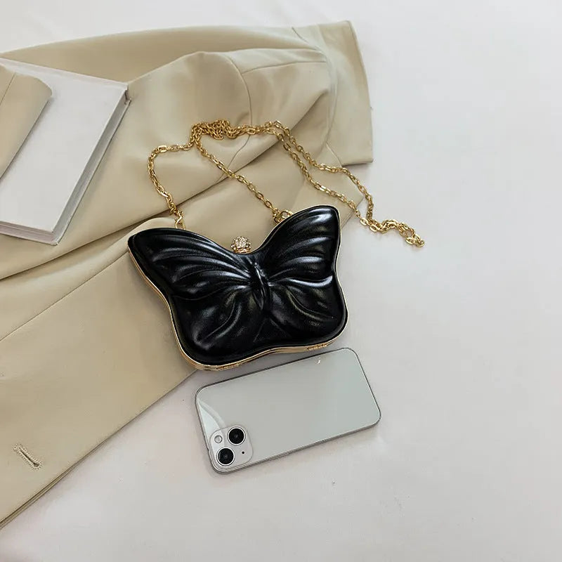Women's cute butterfly chain crossbody bag in PU leather with sandwich pocket, available in black, purple, silver