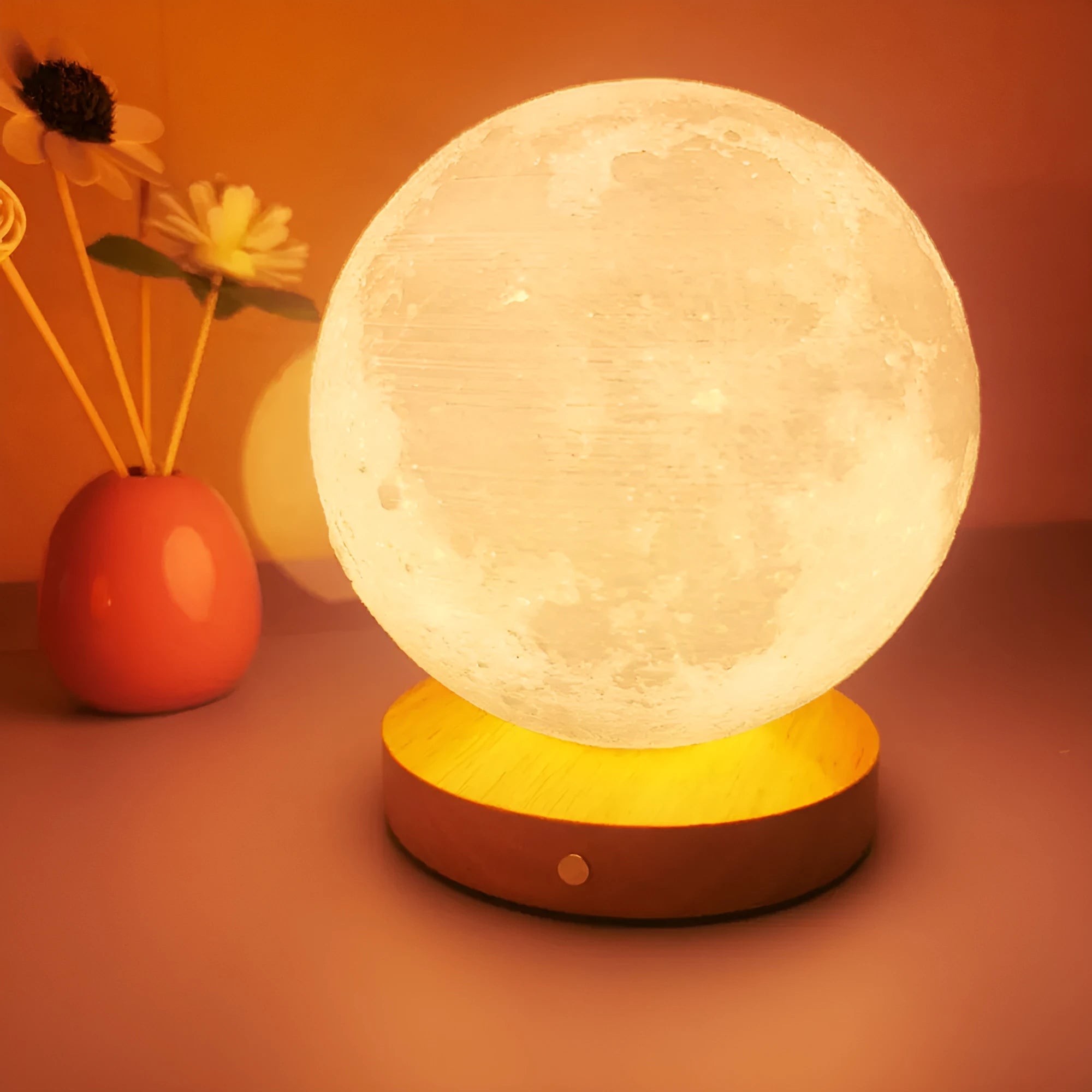 Rotating three-colour moon night lamp with wooden base in Nordic style, showing direct plug connection