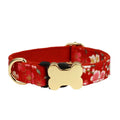 Nylon dog collar with a printed grid pattern and a large bone-shaped metal buckle.