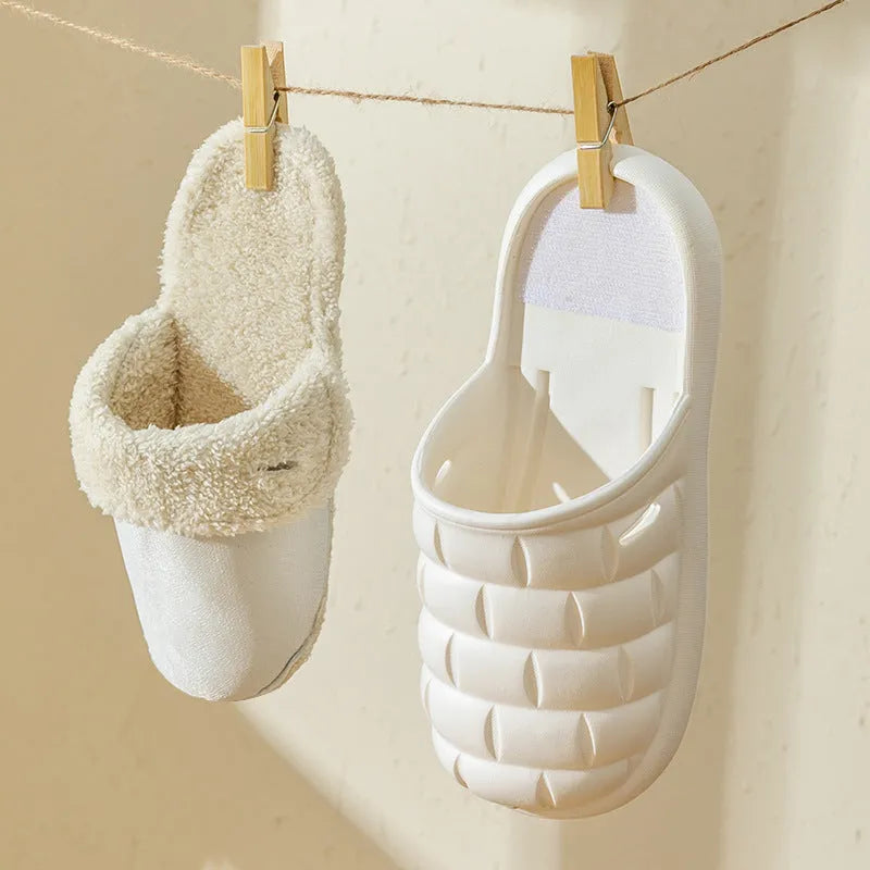 Women's pink detachable plush EVA winter house slippers with non-slip sole shown from the side.