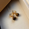 Gold plated tiger's eye geometric earrings in French retro style
