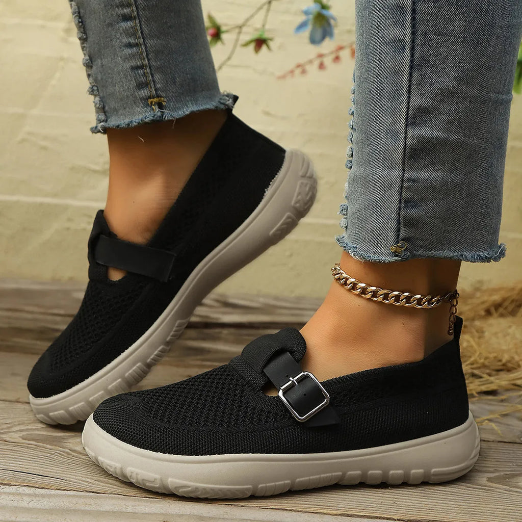 Slip-on sneaker with Flyknit upper, mid-top wedge heel, available in beige, black, brown