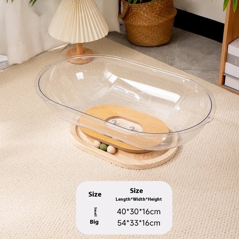 Transparent acrylic bathtub-shaped cat space capsule on a wood board base.