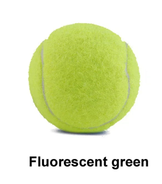 Bright pink, blue, yellow, green, and orange 6.3cm rubber tennis balls for dogs on grass.