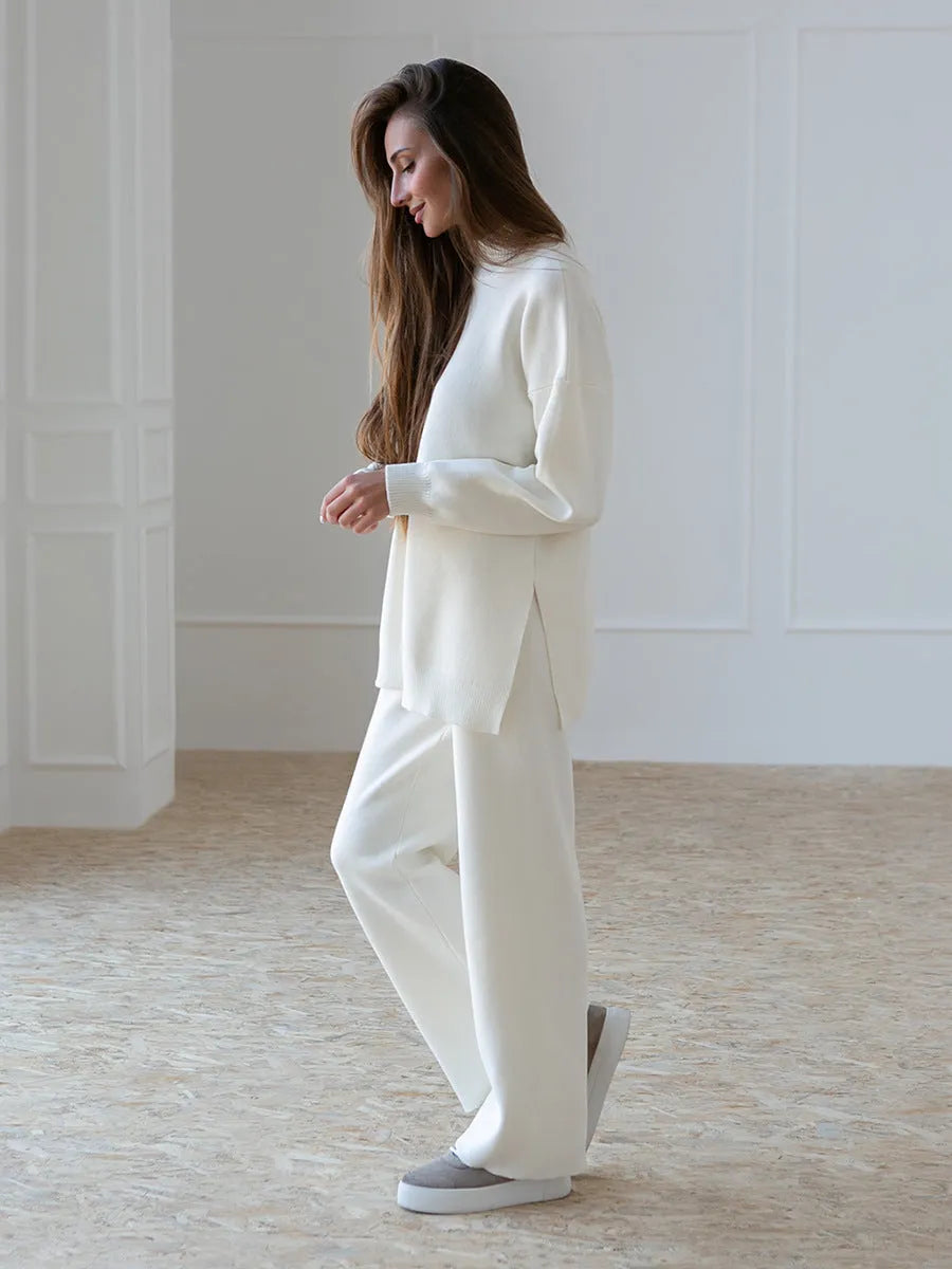 Women's knit sweater suit with turtleneck top and trousers in solid colour, available in green, pink, apricot, white, black