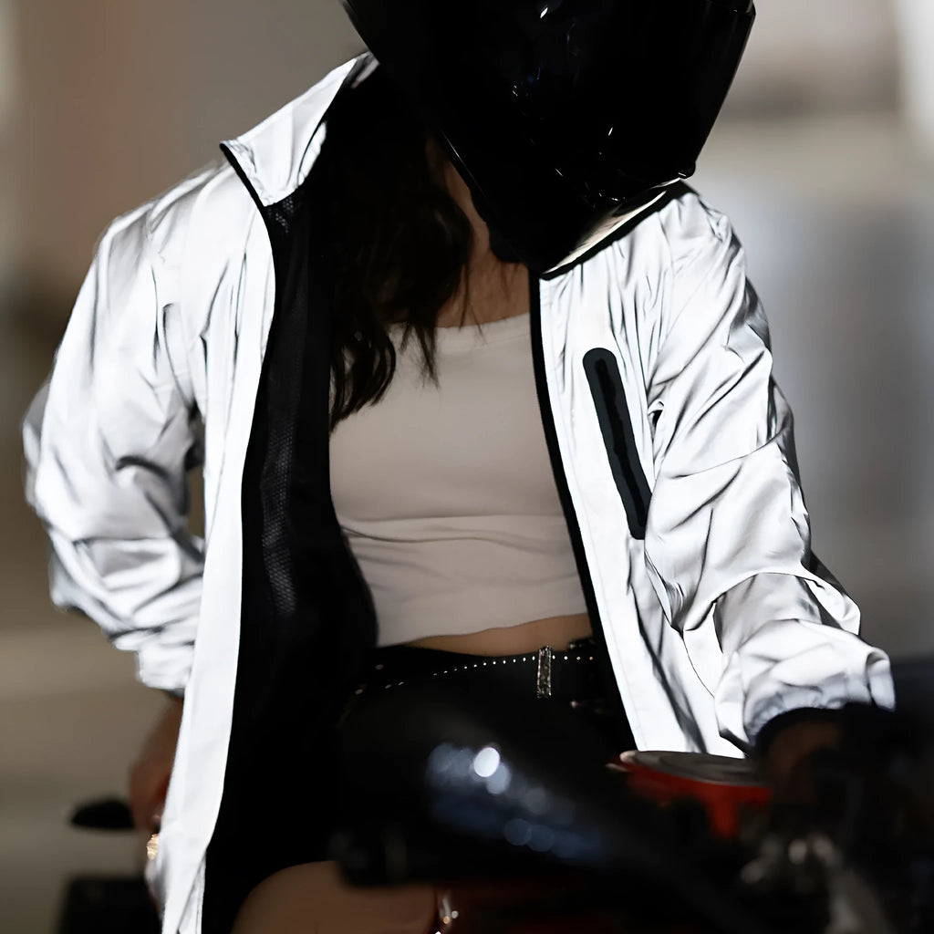 Silver waterproof polyester long sleeved windproof jacket for outdoor activities.