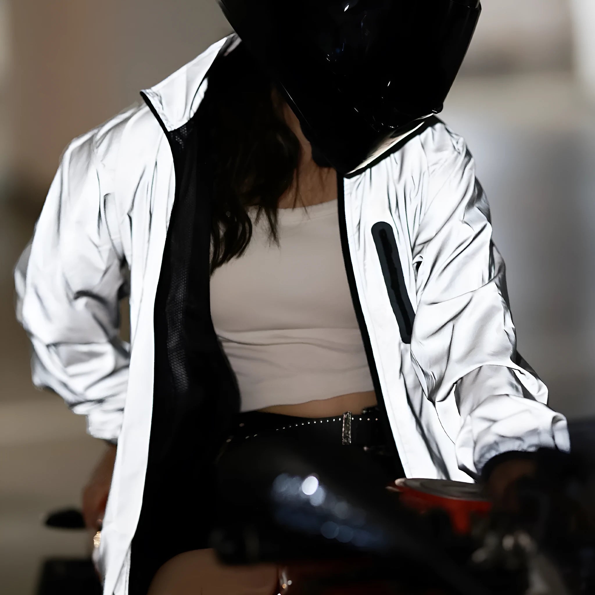 Silver waterproof polyester long sleeved windproof jacket for outdoor activities.