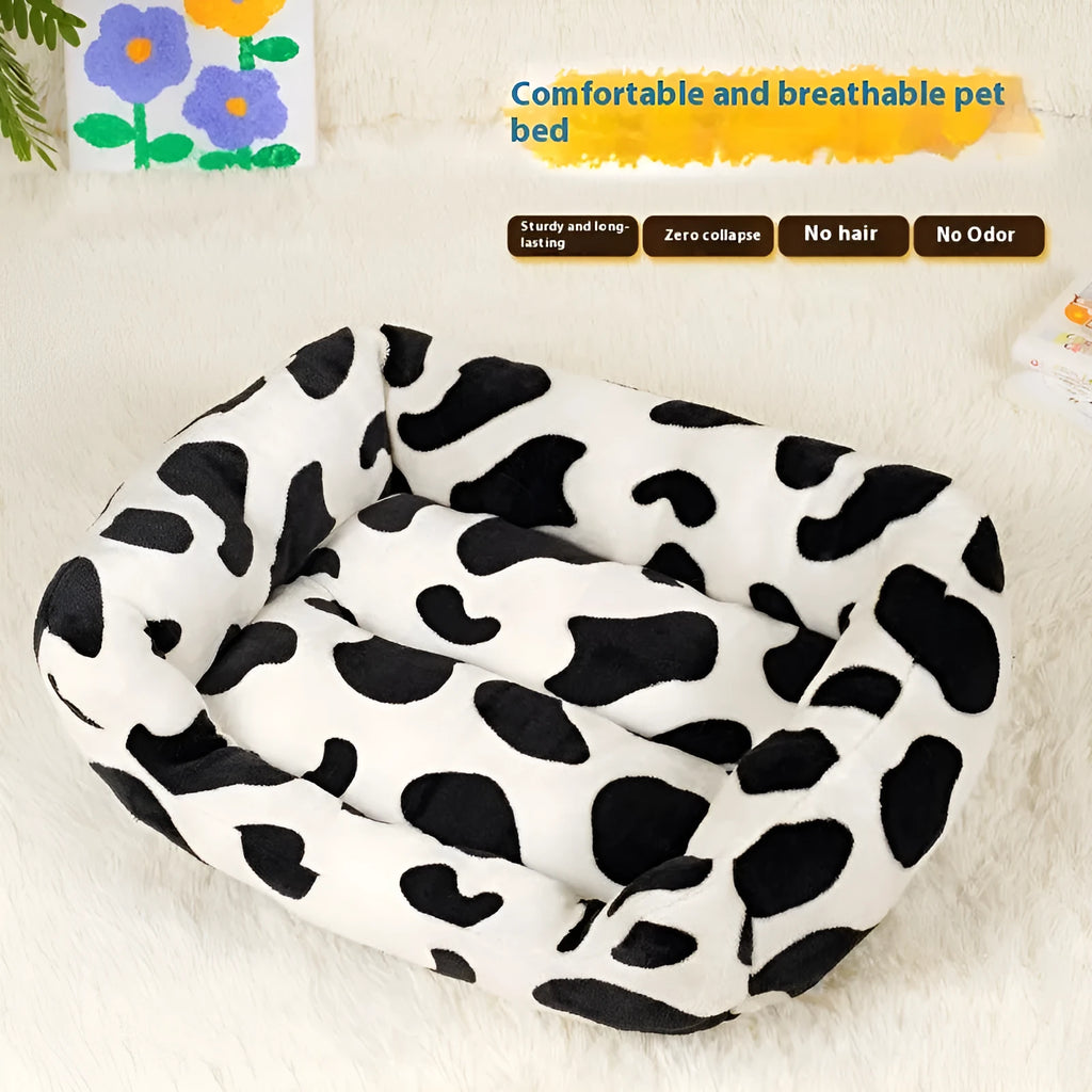 Four Seasons universal kennel dog bed in cow colour cloth, available in sizes S to XL from 30 to 85 cm
