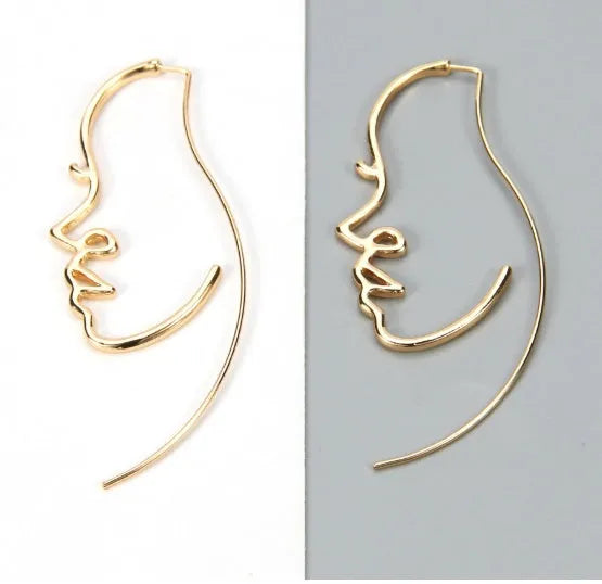 Creative abstract face contour earrings in gold and silver metal finishes, 75 by 35mm