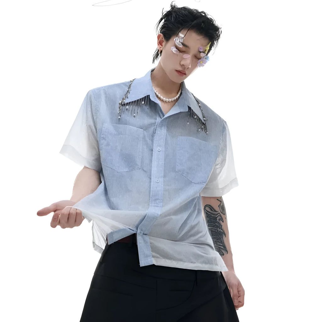 Blue and white gradient short-sleeved loose-fit shirt on a hanger.