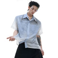 Blue and white gradient short-sleeved loose-fit shirt on a hanger.