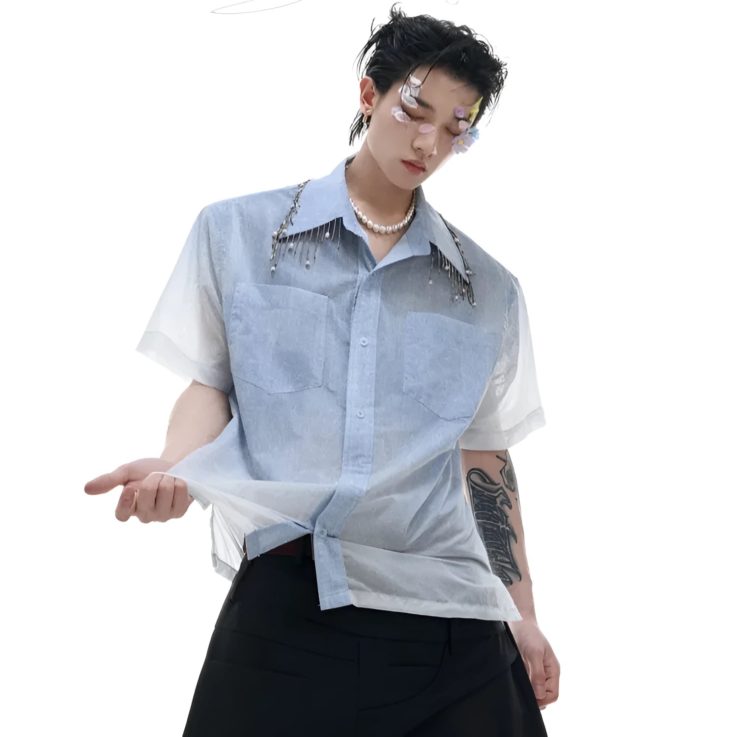 Blue and white gradient short-sleeved loose-fit shirt on a hanger.