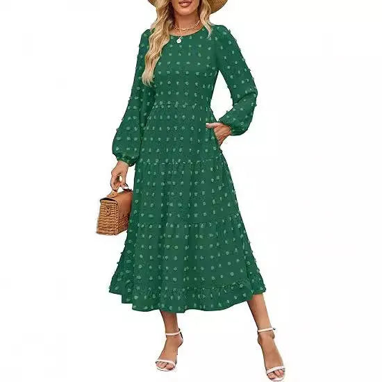 A beige high-waisted long sleeve dress with ruffled sleeves on a hanger.