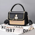 Large capacity PU shoulder bag with wide strap, embroidery detail, and contrast colour in black