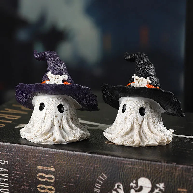 Resin wizard hat holiday ornament in purple and black colour options.