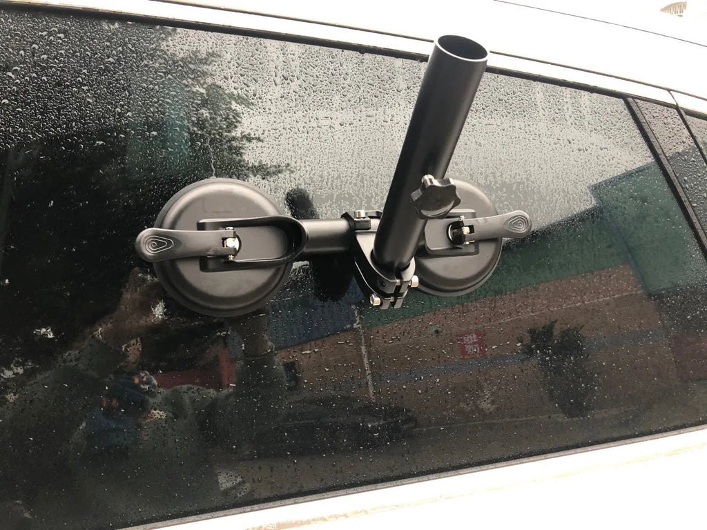Black off-road car windscreen sucker base with a round glass suction cup and heavy rubber disc.