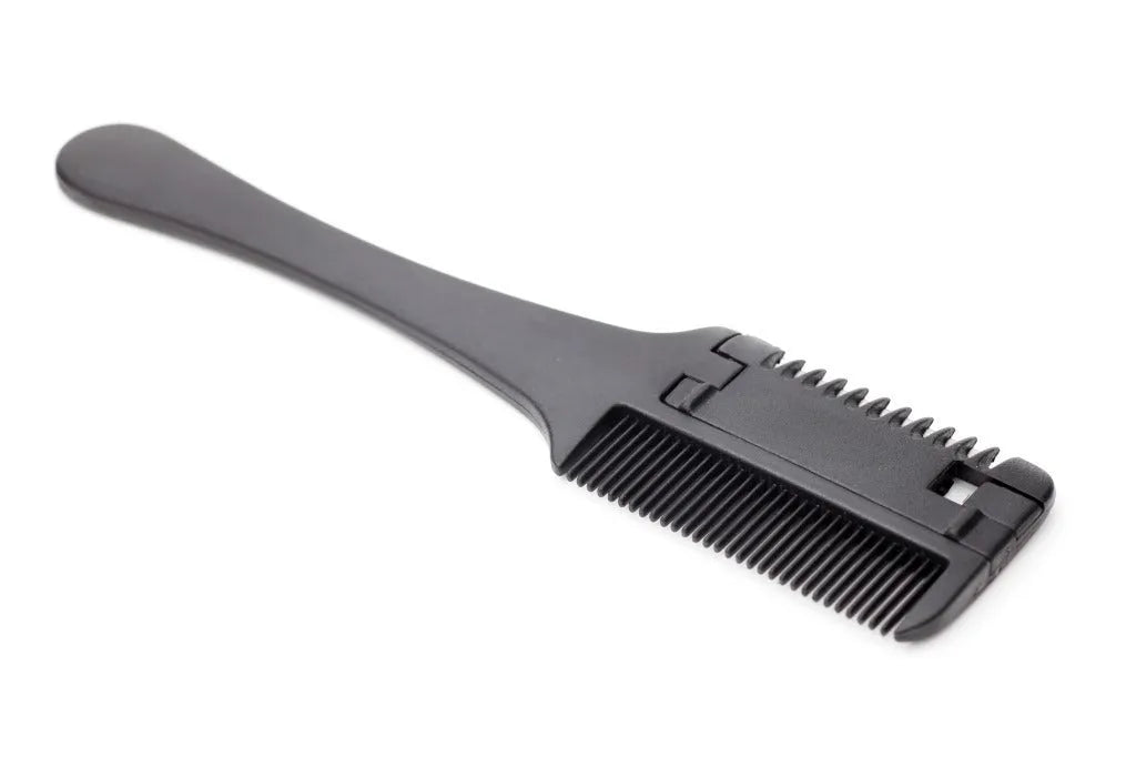 Razor comb for dogs and cats showing comb teeth and built-in blade, with packet of ten spare blades.