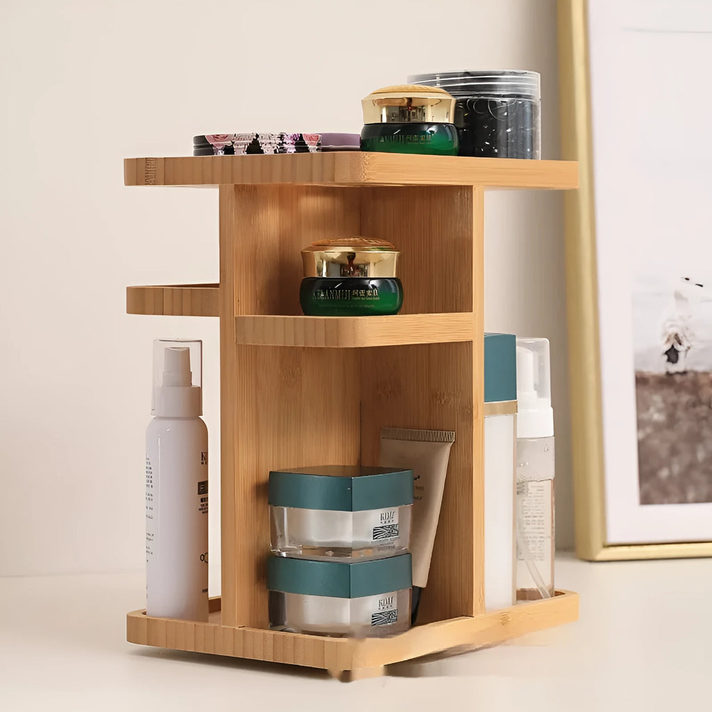 Natural bamboo rotating storage rack with multiple shelves and grid compartments.