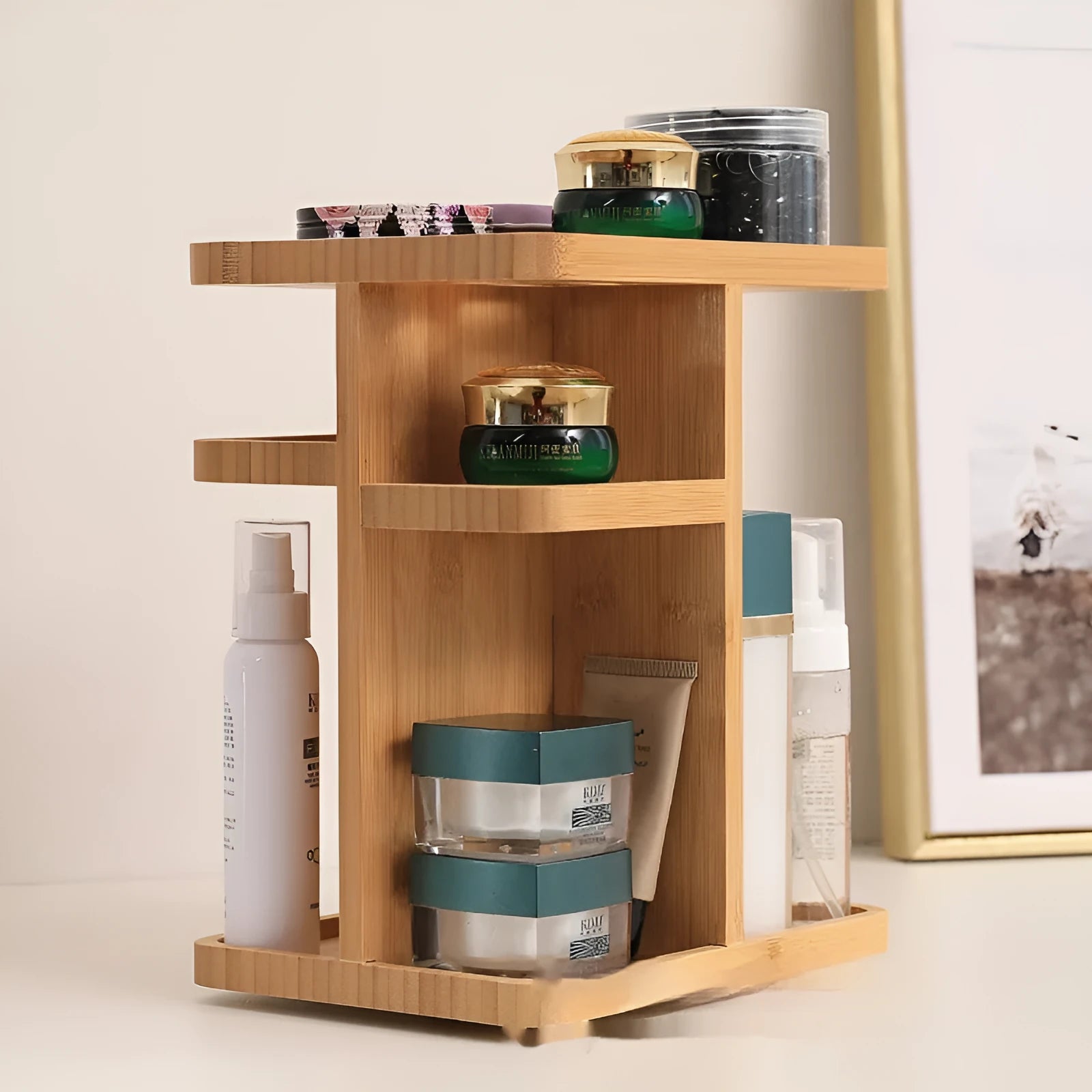 Natural bamboo rotating storage rack with multiple shelves and grid compartments.