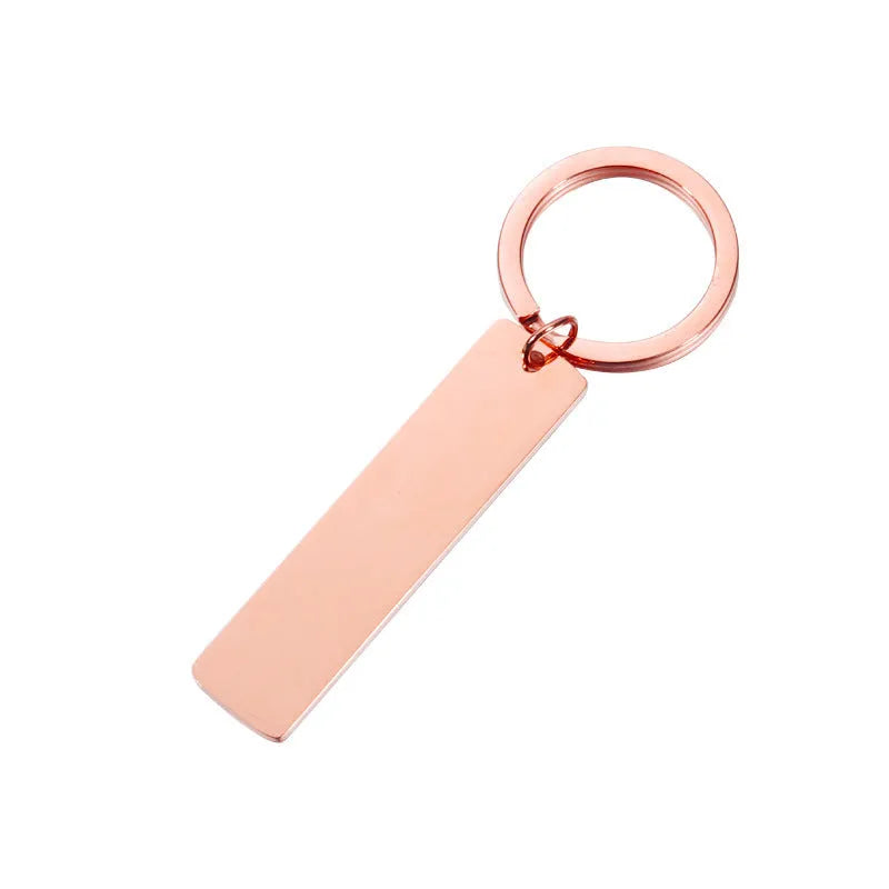 Personalised stainless steel keychain with custom laser engraved Spotify scan code in rose gold colour