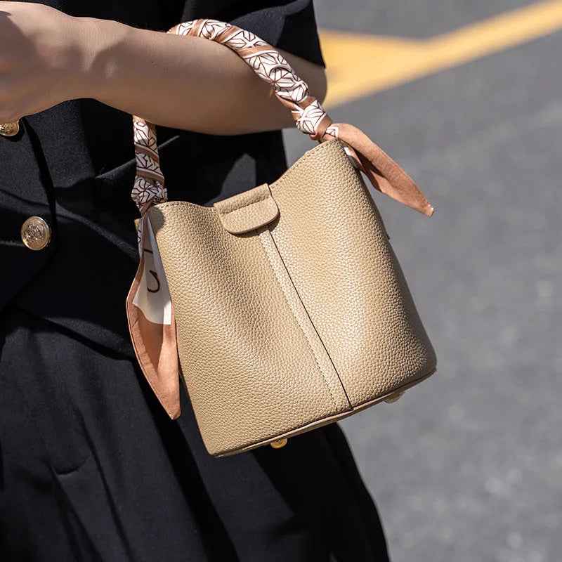 Simple fashion PU handbag for women with bow detail in milky white colour