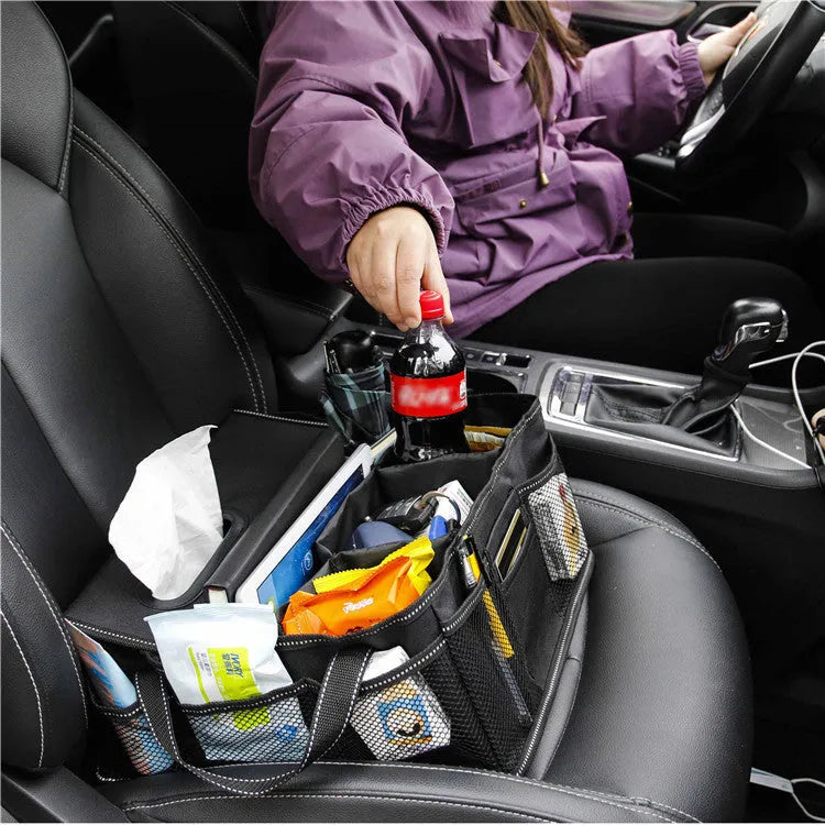 Black Oxford cloth cubic car boot storage box showing dimensions of 33cm wide by 33cm deep by 16cm high.