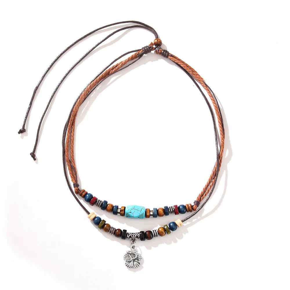 Men's wooden bead necklace with turquoise wax rope and alloy geometric flower pendant in retro design