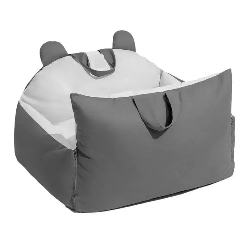 Removable washable car kennel for dogs in beige colour options, shown in a vehicle boot.
