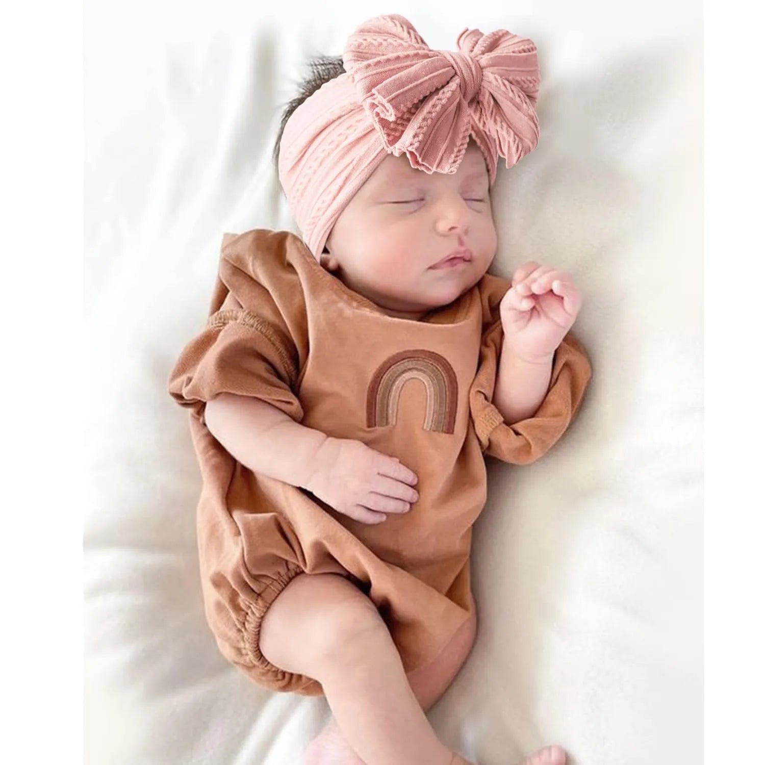 Handmade stretchy nylon baby headband with bow on newborn girl