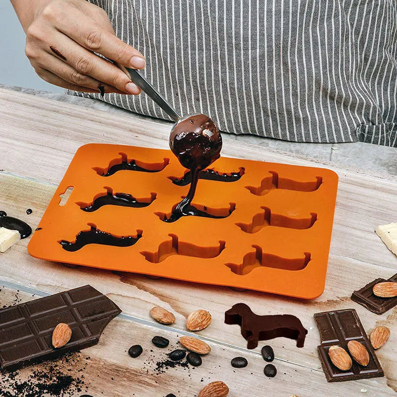 Orange silicone ice mold producing animal-shaped ice cubes for creative drinks