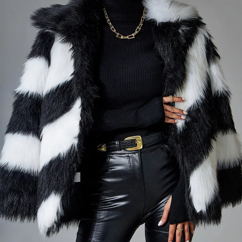 Women's faux fur coat with contrast lapel and detachable fur collar on a hanger.
