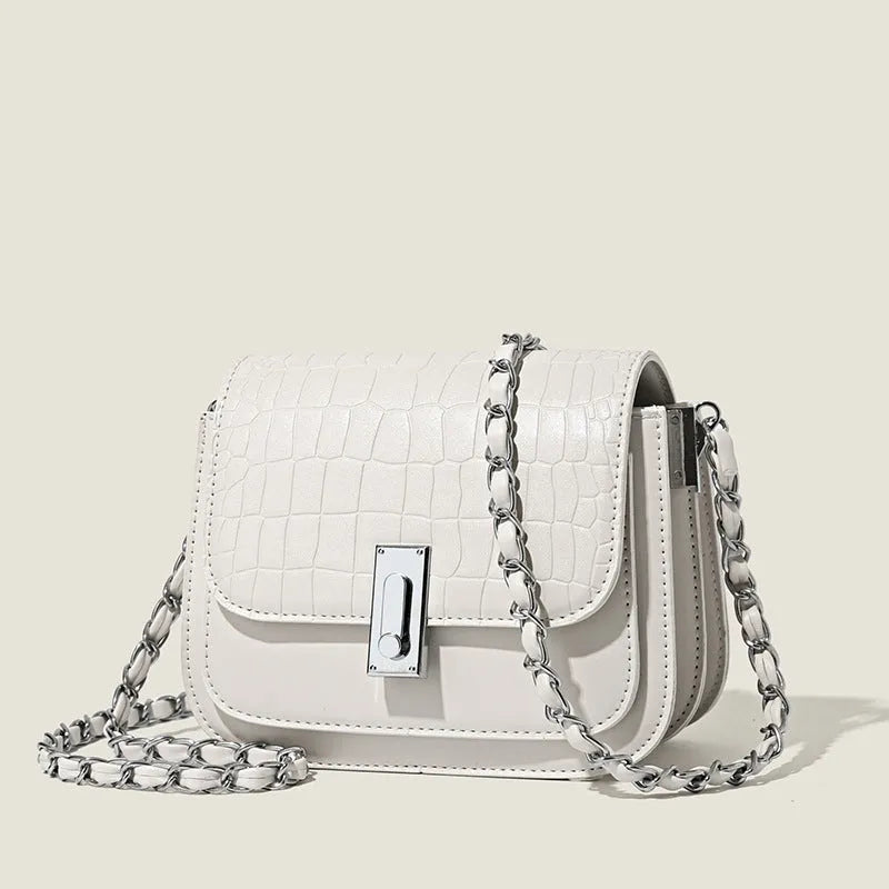 Green soft square women's cross-body shoulder bag with chain strap and external pockets.