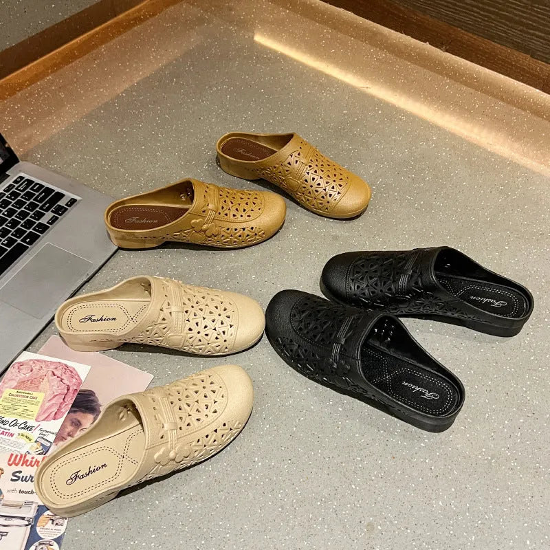 PVC flat toe box half slippers with hollow-out fairy style design in apricot colour.